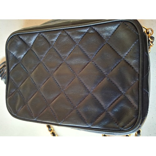 1 - Chanel- A late 1980's/early 1990's navy lambskin leather Matrasse Fringe quilted crossbody bag, 18cm... 
