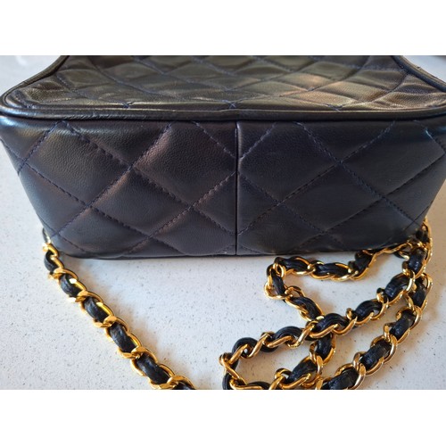 1 - Chanel- A late 1980's/early 1990's navy lambskin leather Matrasse Fringe quilted crossbody bag, 18cm... 