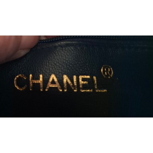 1 - Chanel- A late 1980's/early 1990's navy lambskin leather Matrasse Fringe quilted crossbody bag, 18cm... 
