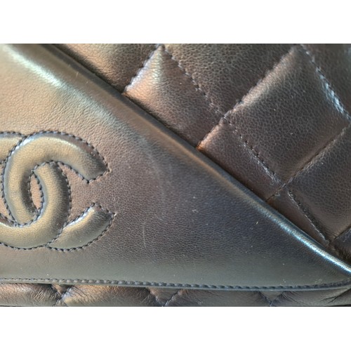 1 - Chanel- A late 1980's/early 1990's navy lambskin leather Matrasse Fringe quilted crossbody bag, 18cm... 
