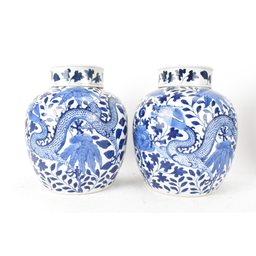 35A - A pair of Chinese blue and white porcelain ginger jars, late Qing dynasty, each of ovoid form with l... 