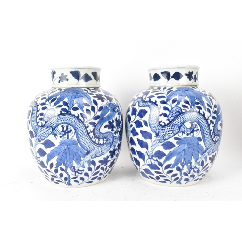 35A - A pair of Chinese blue and white porcelain ginger jars, late Qing dynasty, each of ovoid form with l... 