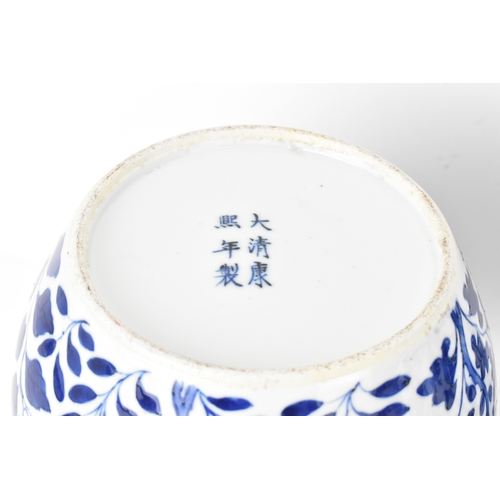 35A - A pair of Chinese blue and white porcelain ginger jars, late Qing dynasty, each of ovoid form with l... 