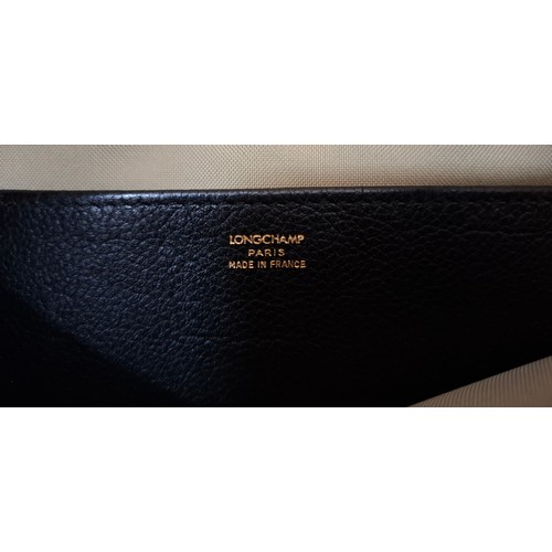 29 - Longchamp- A black textured leather folio and a quantity of miscellaneous gents small leather goods ... 