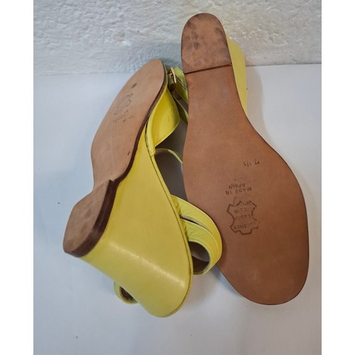 14 - Christian Dior & Versace- A pair of late 20th Century unworn Dior green leather wedge heel sandals s... 