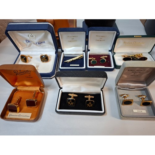 58 - A quantity of cufflinks, cloth badges, sporting brooches and small collectables to include 2 reprodu... 