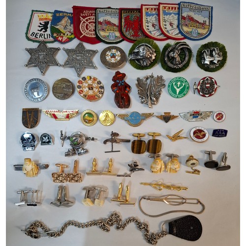 58 - A quantity of cufflinks, cloth badges, sporting brooches and small collectables to include 2 reprodu... 