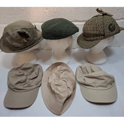 60 - Vintage hunting and deerstalker hats to include a German Terzel green cord hat with 2 hunting relate... 
