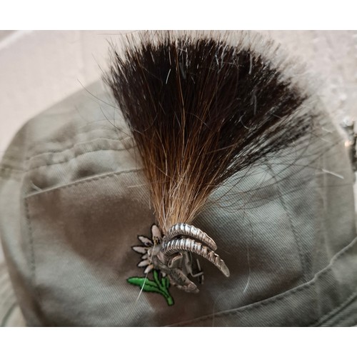 60 - Vintage hunting and deerstalker hats to include a German Terzel green cord hat with 2 hunting relate... 