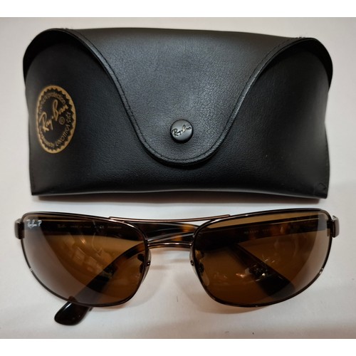 61 - Ray Bans- A pair of RB3445 brown metallic framed sunglasses with tortoiseshell effect temples and br... 