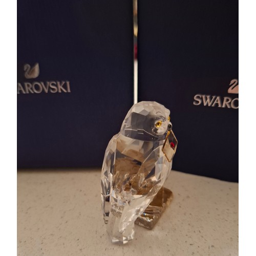 12 - Tiffany and Swarovski- A Sterling silver Tiffany & Co heart shaped perfume flask inscribed with the ... 