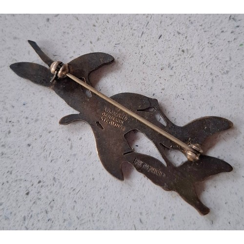 31 - Three enamel brooches to include a mid 20th Century Danish Modernist Erik Magnussen silver and white... 