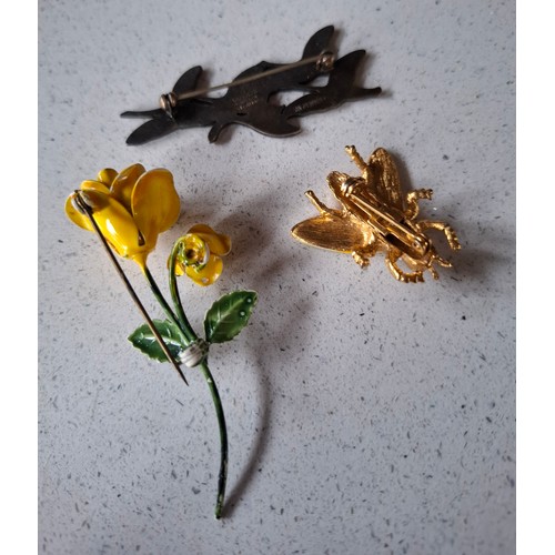 31 - Three enamel brooches to include a mid 20th Century Danish Modernist Erik Magnussen silver and white... 
