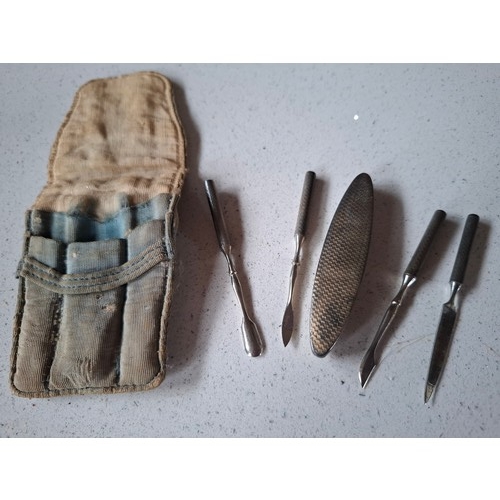 52 - A small lot comprising silver buckles and a pocket silver backed manicure set. Location:A4M
If there... 