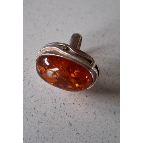 51 - A silver and amber ring. Location:CAB 1
If there is no condition report, please request