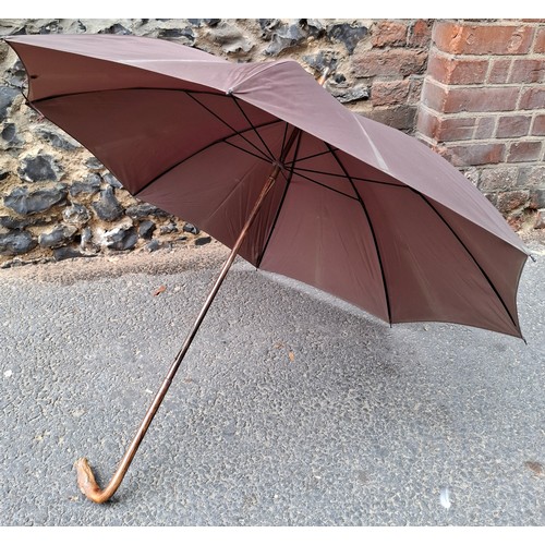 44 - A vintage S.Fox & Co Paragon Laurus brown umbrella having a treen cane effect handle terminating in ... 