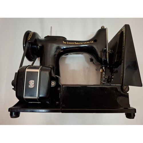 46 - A 1957 Singer Feather weight 222K electric sewing machine serial no:EM957054 with case and accessori... 