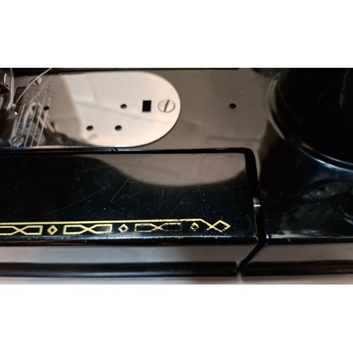 46 - A 1957 Singer Feather weight 222K electric sewing machine serial no:EM957054 with case and accessori... 