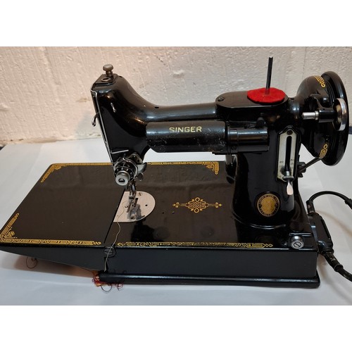 47 - A 1950'S electric Singer 221K sewing machine A/F, serial no:EG305413 with case and accessories. Loca... 