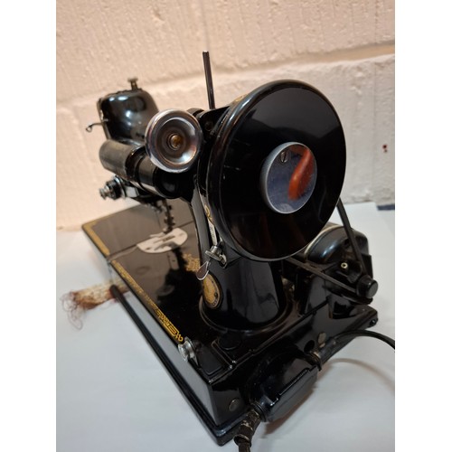 47 - A 1950'S electric Singer 221K sewing machine A/F, serial no:EG305413 with case and accessories. Loca... 
