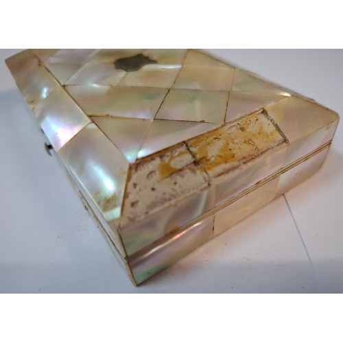 50 - A quantity of compacts to include Kigu, 2 silver topped glass scent bottles, a mother of pearl manic... 