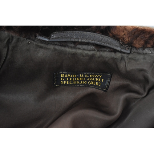 42 - A 1940s leather flying jacket A/F, with label 'Buaer U.S Navy G-1 flight Jacket Spec.55J14 (AER). Lo... 