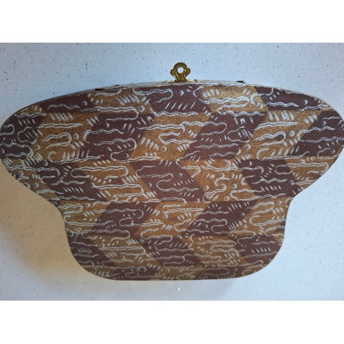 34 - Vintage costume jewellery to include a rolled gold engraved and hinged bangle and 2 other yellow met... 