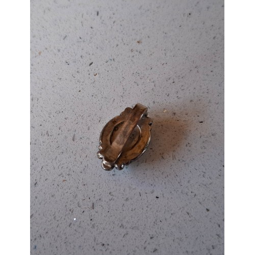 34 - Vintage costume jewellery to include a rolled gold engraved and hinged bangle and 2 other yellow met... 