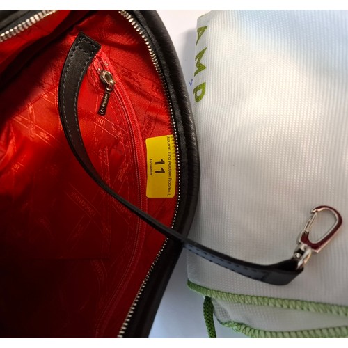 11 - Longchamp- A black leather crossbody bag, 26cm wide x 26cm high, having silver tone hardware, red br... 