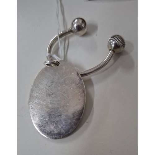 21 - A Harrods silver key ring, London 2003, weight 21.7g
Location: CAB 1
If there is no condition report... 