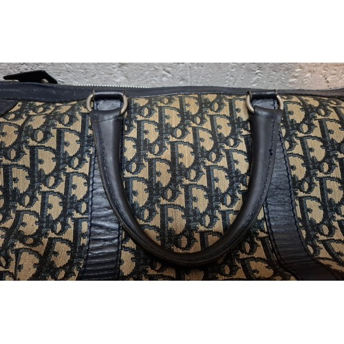 15 - Christian Dior & Fendi- A late 1960's Dior Trotter bag in iconic Dior Oblique design having navy lea... 