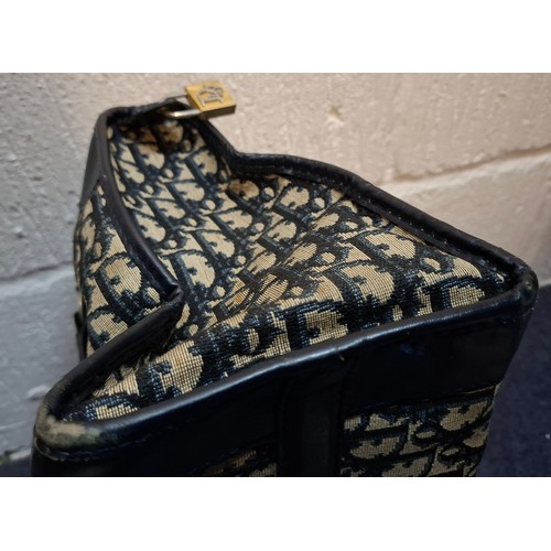 15 - Christian Dior & Fendi- A late 1960's Dior Trotter bag in iconic Dior Oblique design having navy lea... 
