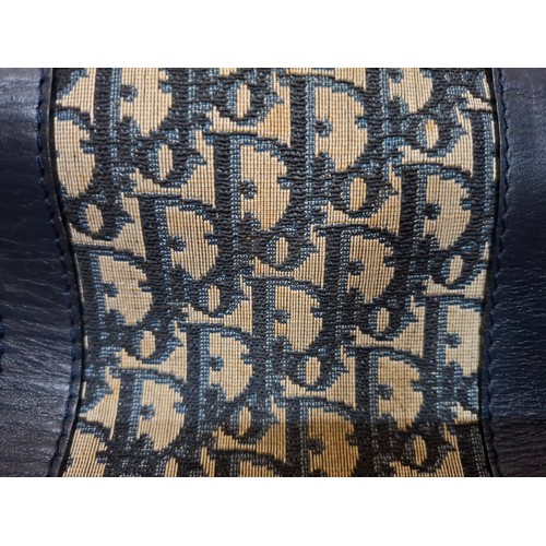 15 - Christian Dior & Fendi- A late 1960's Dior Trotter bag in iconic Dior Oblique design having navy lea... 