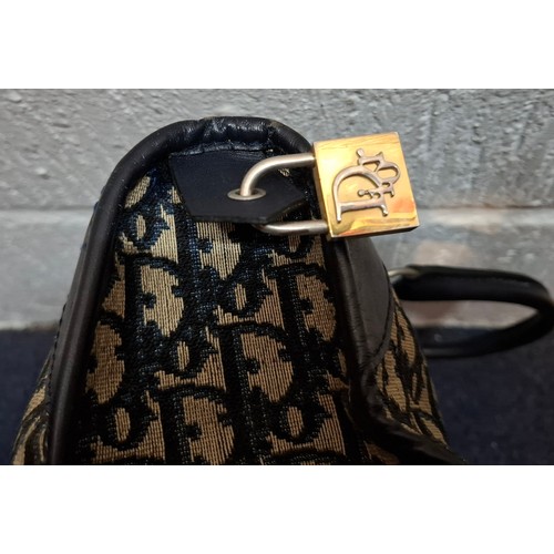 15 - Christian Dior & Fendi- A late 1960's Dior Trotter bag in iconic Dior Oblique design having navy lea... 