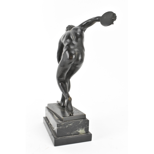 11 - A late 19th/early 20th century Grand Tour bronze figure of the Discobolus, the nude athlete poised i... 