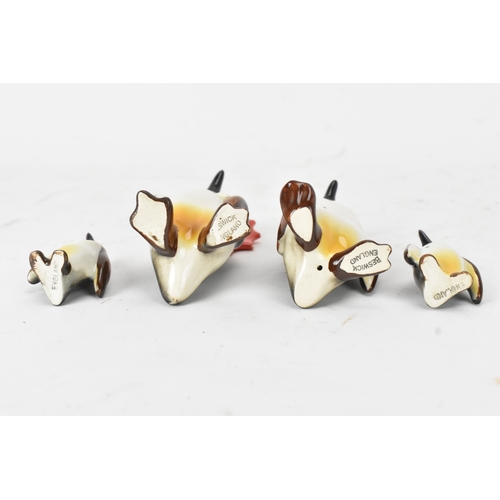 27 - A group of Beswick pottery penguin figures, comprising a family group of four including one adult ho... 
