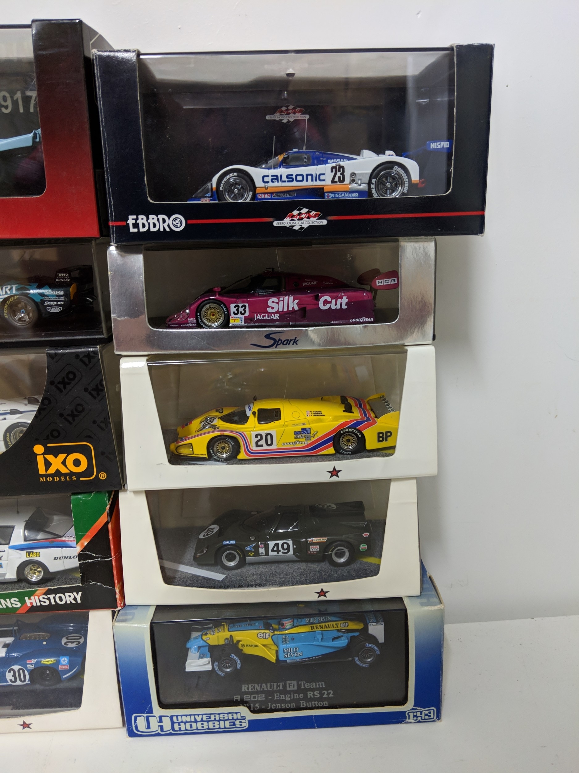 Twenty-five cased model racing cars to include Le Mans racing cars ...