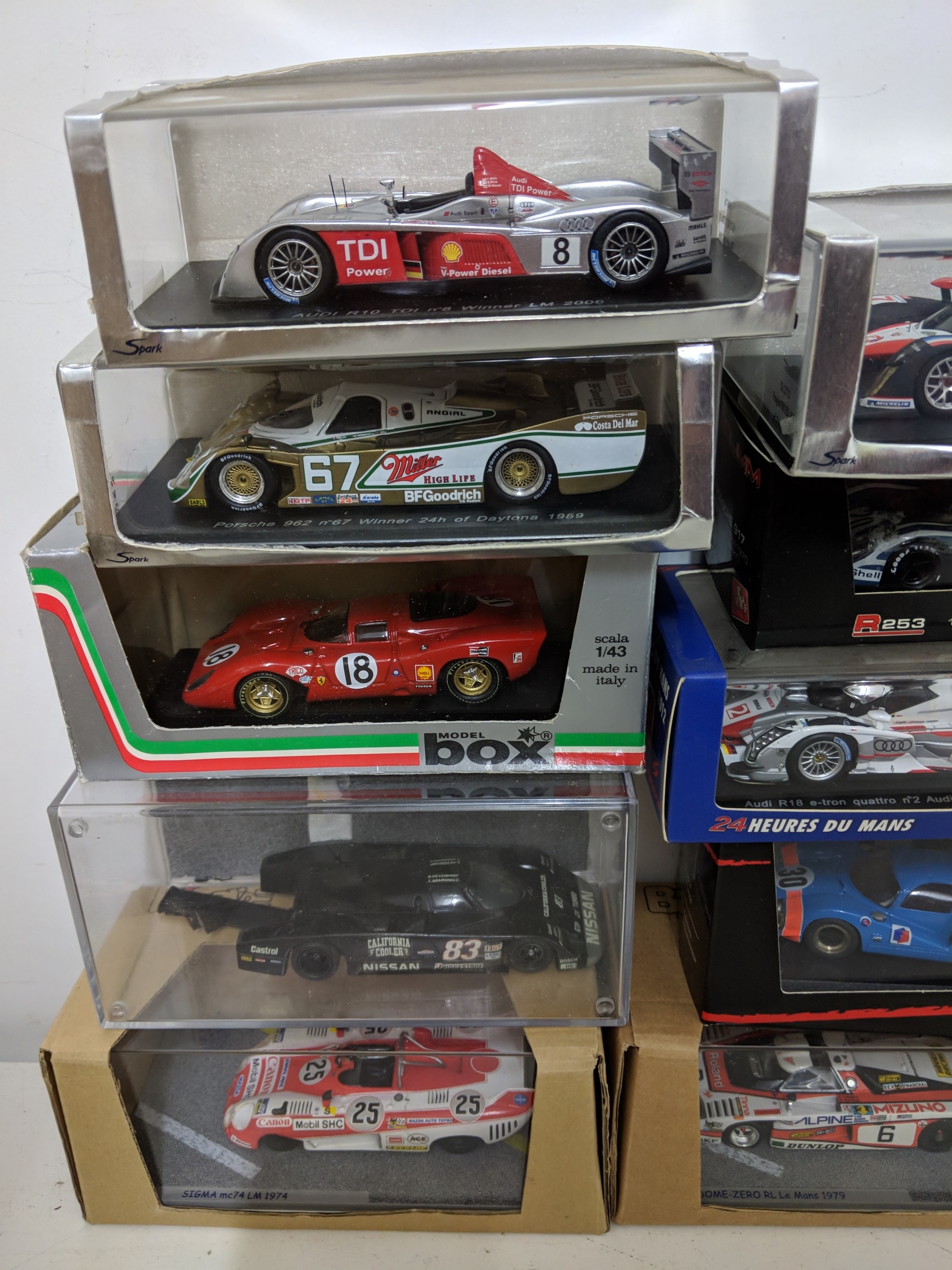 Twenty-five cased model racing cars to include Le Mans racing cars ...