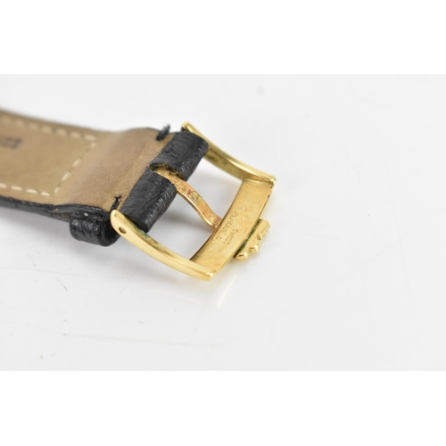 20 - A Corum Golden Bridge, manual wind, gents, 18ct gold wristwatch, the skeleton dial having 18K engrav... 