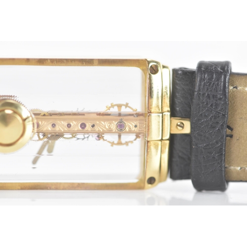 20 - A Corum Golden Bridge, manual wind, gents, 18ct gold wristwatch, the skeleton dial having 18K engrav... 