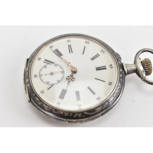 23 - A late 19th century continental silver and niello open face pocket watch, the white enamel dial with... 