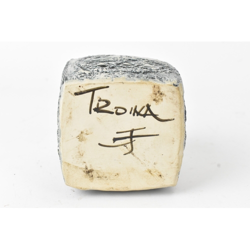 20 - A Troika pottery marmalade pot by Jane Fitzgerald, having geometric designs in relief and incised on... 