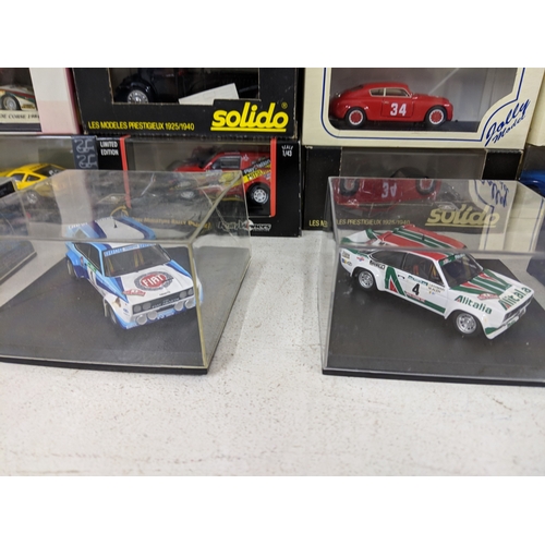 202 - Thirty boxed model cars to include Skid Lancia Fulvia, an Ixo model or a rally Mitsubishi Lancer, Di... 