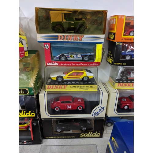 202 - Thirty boxed model cars to include Skid Lancia Fulvia, an Ixo model or a rally Mitsubishi Lancer, Di... 