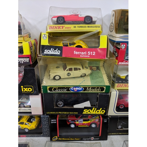 202 - Thirty boxed model cars to include Skid Lancia Fulvia, an Ixo model or a rally Mitsubishi Lancer, Di... 