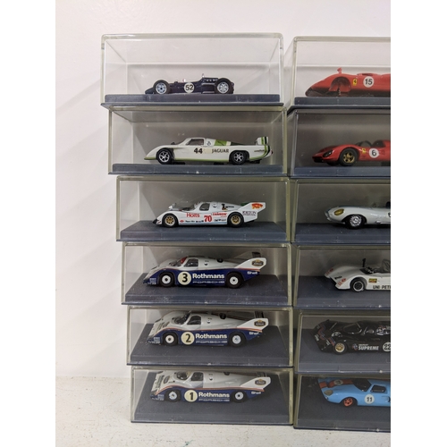 204 - Thirty cased Schuco Piccolo models of racing cars to include Rothmans Porsche, Ford GT40, Ferrari an... 
