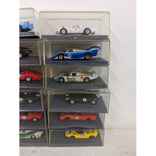 204 - Thirty cased Schuco Piccolo models of racing cars to include Rothmans Porsche, Ford GT40, Ferrari an... 