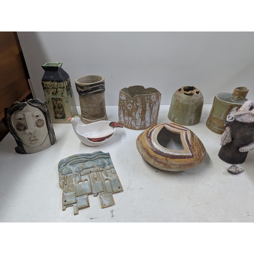 309 - Studio pottery to include vases and other examples, some signed TJT
Location: 1-2
If there is no con... 