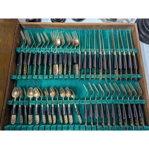 57 - Mixed metalware to include a selection of silverplated trophy cups together with a Thai bronze and w... 