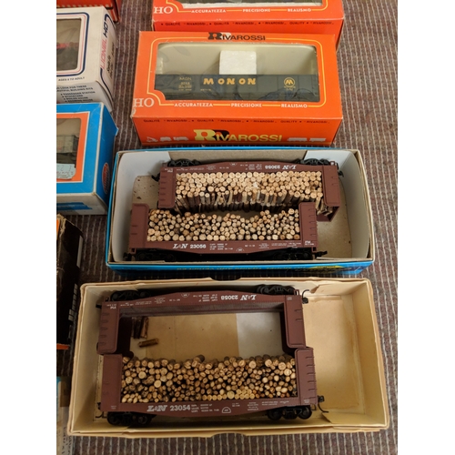 350 - Mostly boxed freight cars to include some tanker cars, carriages, rolling stock by Riva Rossi, Lione... 